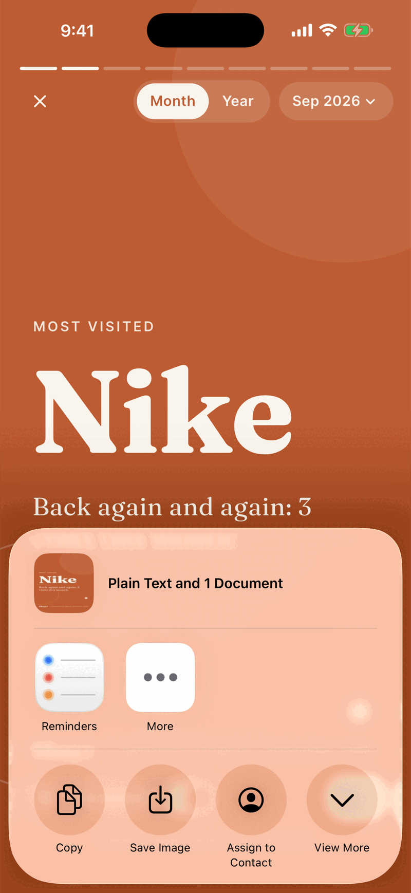 The iOS share sheet over a Wrapped card, offering the image to Reminders, More, Copy, Save Image and Assign to Contact.